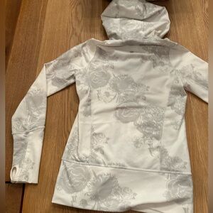 Lululemon “vintage” design long stretch zip jacket floral pattern with hood